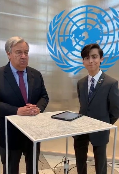A picture of Aidan Gallagher with the Secretary-General of the United Nations (UN).